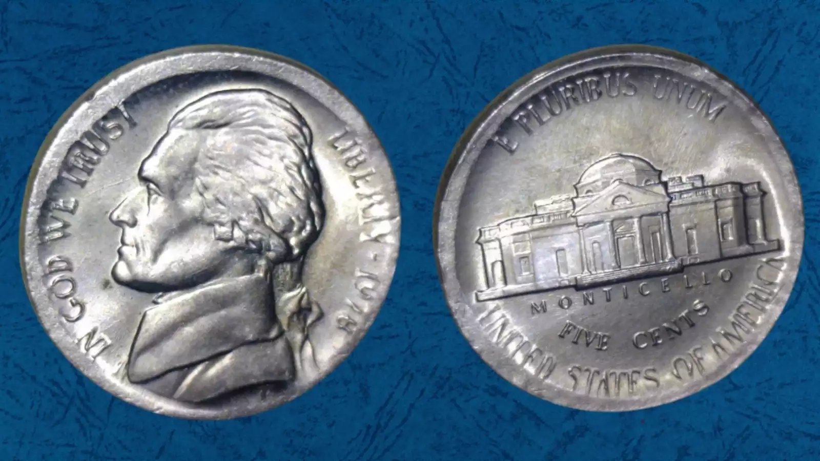 1978 Jefferson Nickel broadstrike error showing design spread wider than normal with missing collar restraint and weak rim